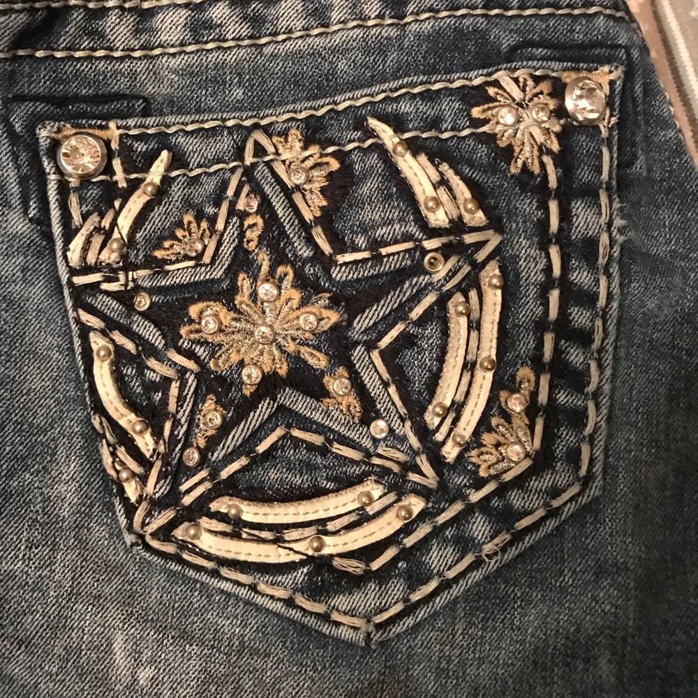 Size 26. Horseshoe and star. Miss me Jeans.